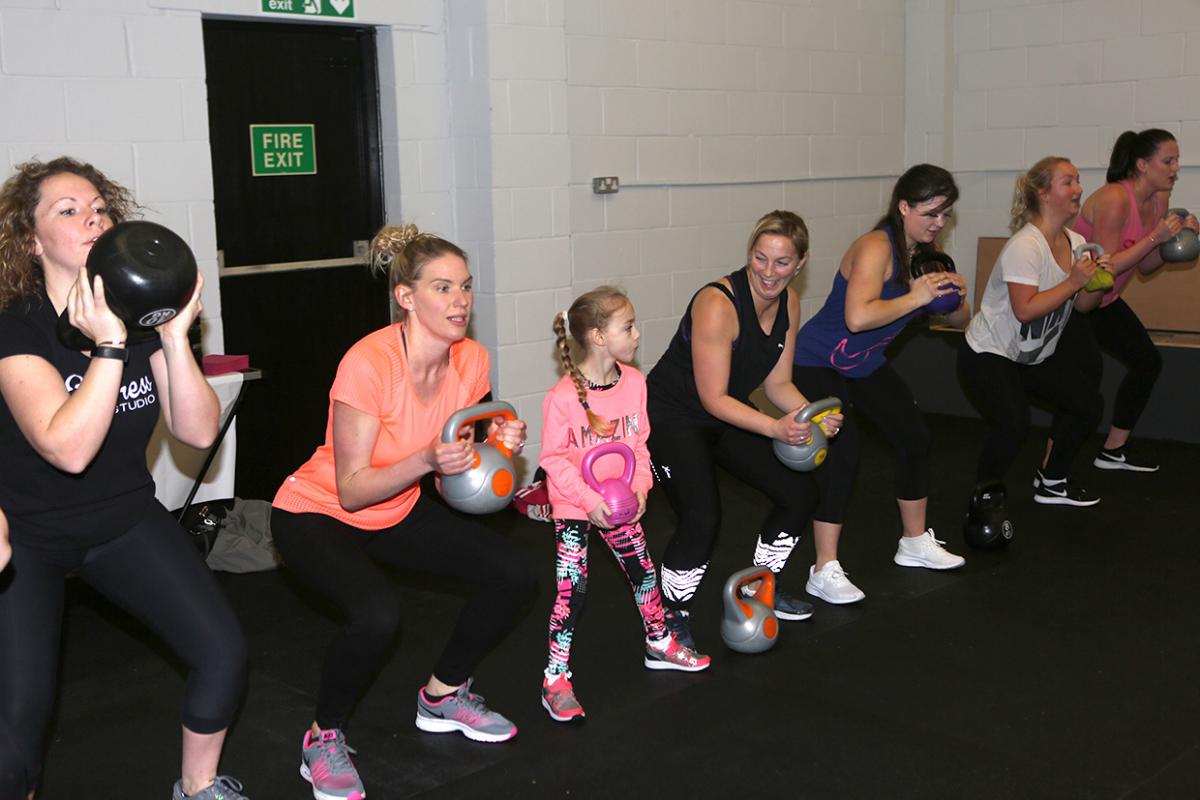 Weighted kettle bell dips are part of the gruelling regime