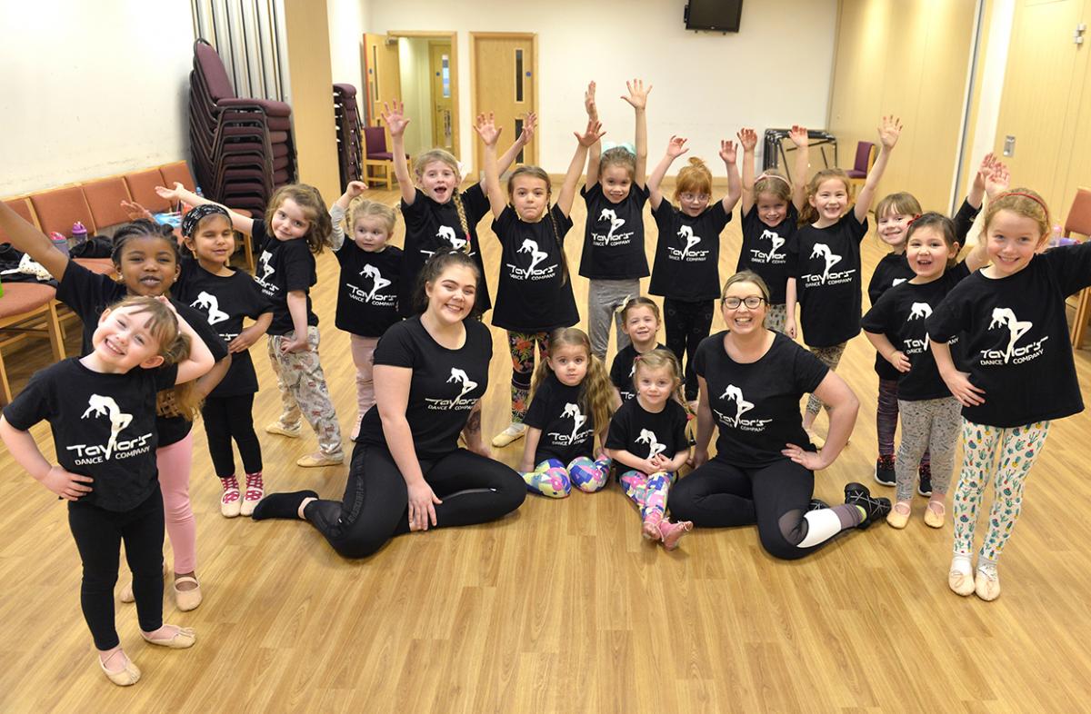 Assistant Nicole Taylor with school founder Niki Taylor and their tiny dancers