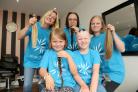 Laura Clements,  Nadine Blackwell, Evie Blackwell,  Erin Blackwell and Sarah Payne..Me & You Salon, 206 High Road, Benfleet .A mother and daughter and two friends are donating their hair to the Little Princess Trust to fundraise for Alopecia UK. Her other