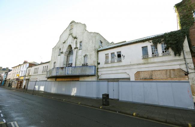 Barred - hoarding has been installed at the old Odeon cinema and the windows have been boarded