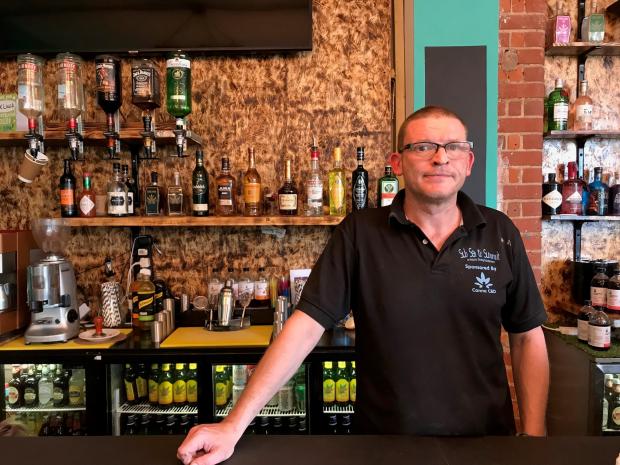 Gazette: Tim Acton behind the bar at Green Coffee Lab
